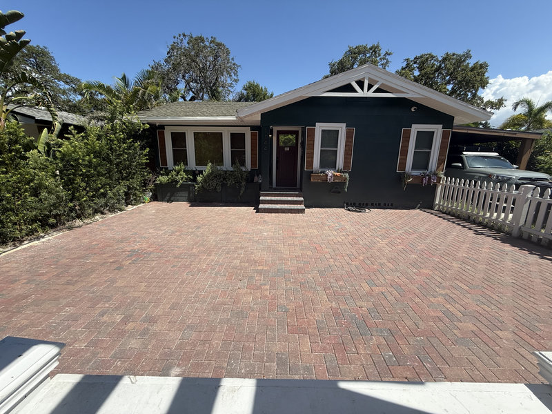 Freshly poured concrete driveway at a suburban Brandon home