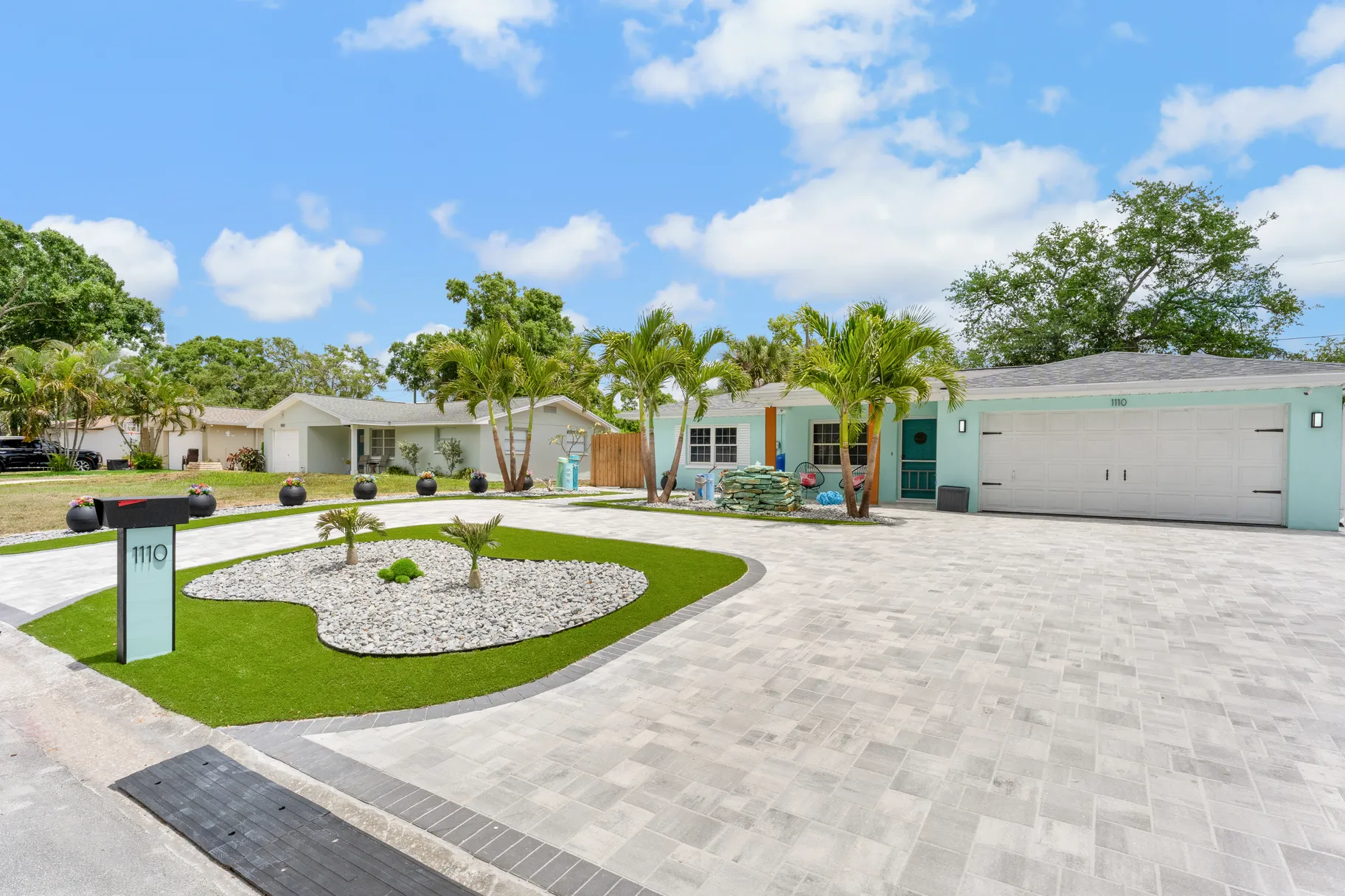 Paver pool deck and screened lanai at a Brandon subdivision home