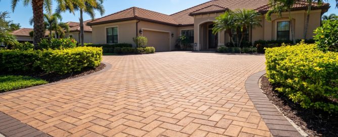 Newly installed herringbone paver driveway at a Pinellas County home, the finish a paver driveway cost quote should buy