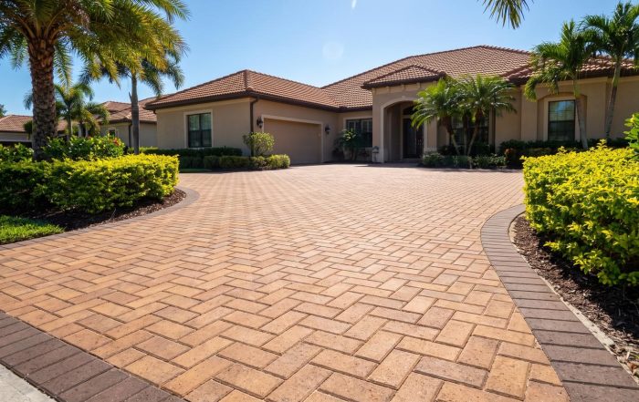 Newly installed herringbone paver driveway at a Pinellas County home, the finish a paver driveway cost quote should buy
